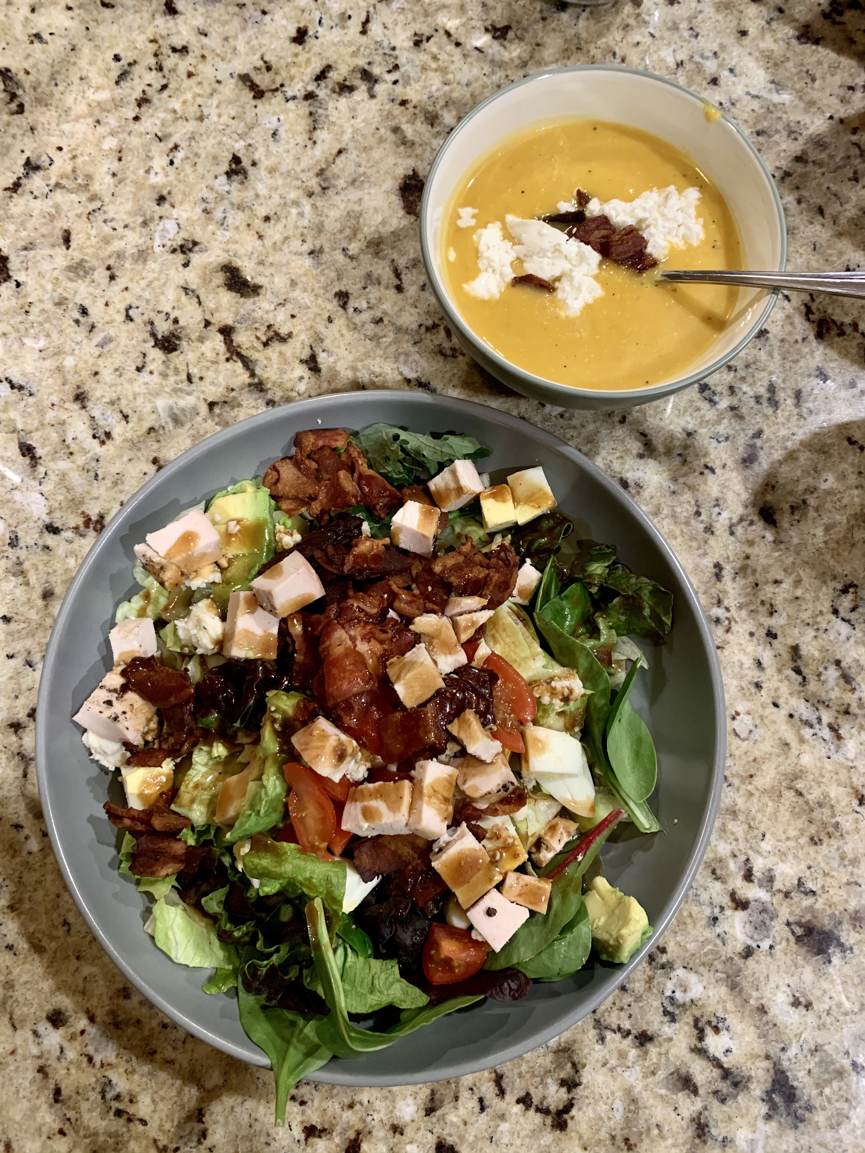 Keto food diary!  Cobb salad and butternut squash soup in nice dishes on a countertop