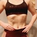 post keto figure, blonde woman's midsection in workout gear
