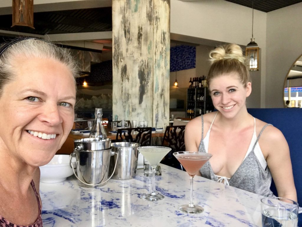 two blonde ladies having a martini at Mussel Beach restaurant on a trip to Delray Beach, Florida.